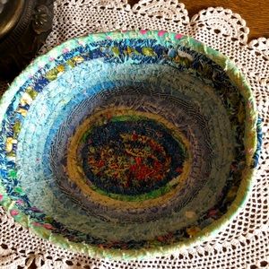 Handmade fabric bowl with shades of blue fabric.